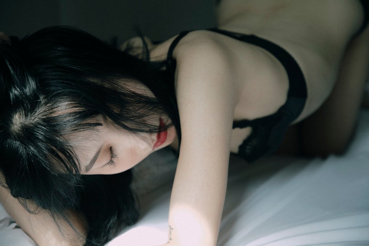 Noir velvet bodysuit with plunging neckline